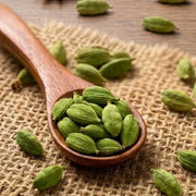 Swaadrani eco-friendly premium green cardamom pods zip-lock pouch showing fresh, sealed spices ready for delivery.