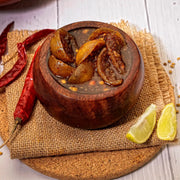 Swaadrani traditional North Indian style Lemon Pickle (Nimbu ka Achar) made with fresh diced lemons, mustard oil, and authentic aromatic spices in a bowl.