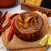 Swaadrani traditional North Indian style Lemon Pickle (Nimbu ka Achar) made with fresh diced lemons, mustard oil, and authentic aromatic spices in a bowl.